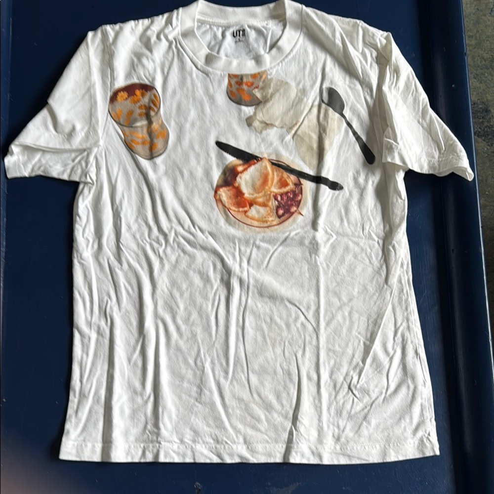 Uniqlo White Short Sleeve Tee with Tea party Graphic Design